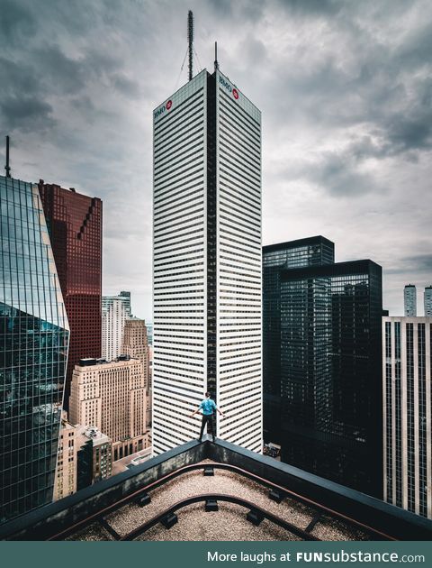 Standing on the edge of a skyscraper in Toronto