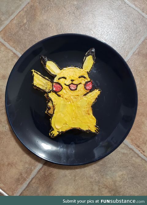 Made a mini Pikachu cake! It wasn't supposed to be tiny but I've never made a cake before