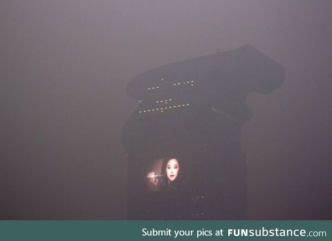 This building in smoggy Beijing looks like a scene from Blade Runner