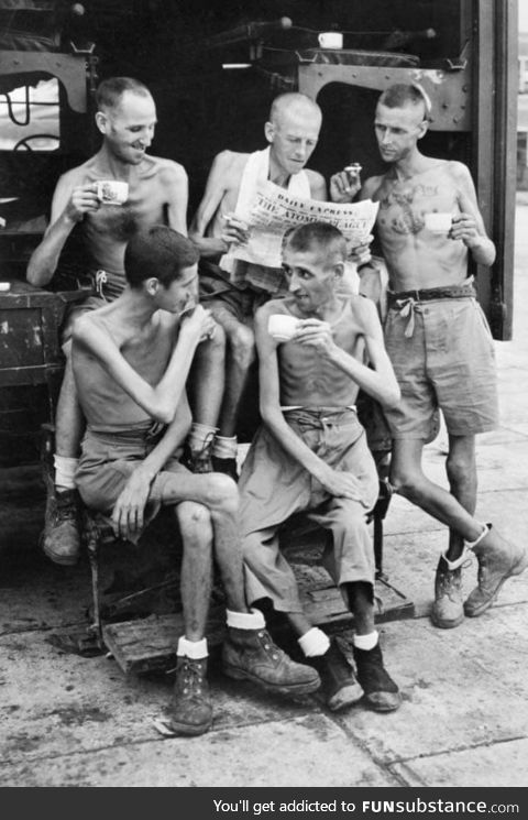 Australian prisoners of war enjoying tea after releasing from Japanese captivity at the