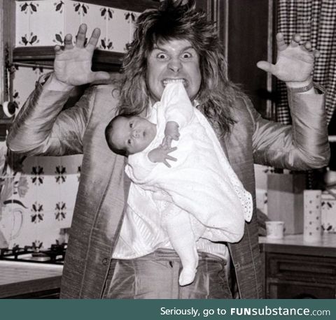 Ozzy Osbourne pictured at home 2 weeks after the birth of his son Jack, 1985