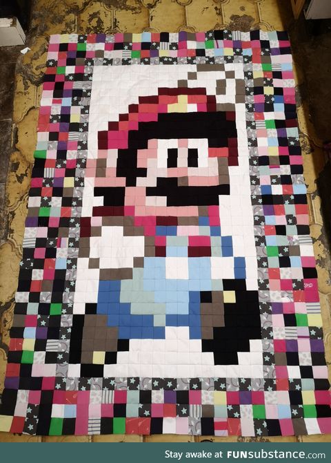 I made a quilt with 1014 two inch squares