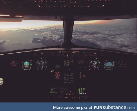 The c*ckpit of an Airbus 320 cruising over San Juan, Puerto Rico at 36,000 feet