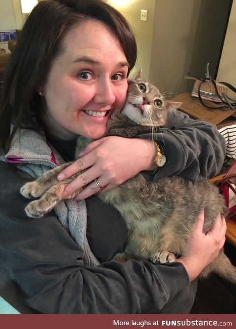 Our cat does this whenever she gets picked up