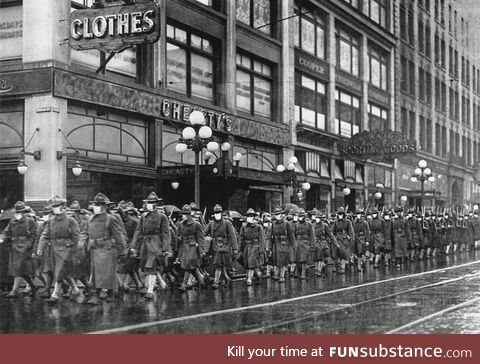 The U.S. Army 39th regiment wear masks to prevent influenza in Seattle in December of 1918