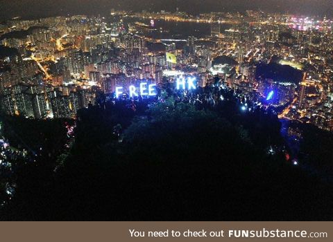 Thousands of citizens formed human chain during Mid-Autumn Festival on Lion Rock, Hong