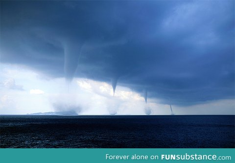 4 waterspouts in a row