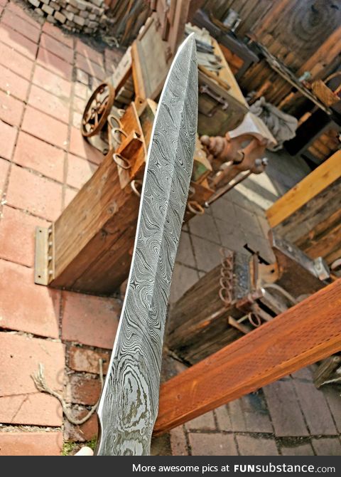 Hand forged Damascus sword
