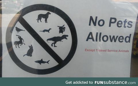 This no pets sign in a shop window