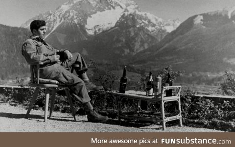American paratrooper drinks Hitler’s cognac on his patio as the Allies occupy his