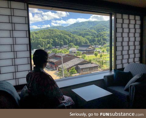 My wife looks over the town of Yuwaku in Ishikawa Prefecture before going to breakfast