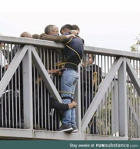 Crowd saves would-be bridge jumper