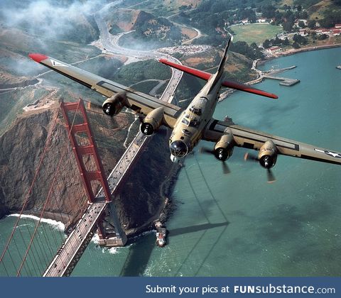 B-17 WWII bomber beautifully flying over the Golden Gate bridge