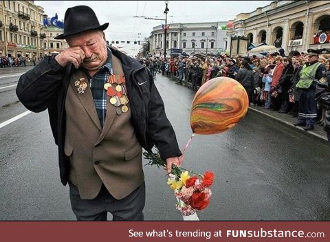 WW2 Vet walking alone on Victory Day. He is the last of his squad