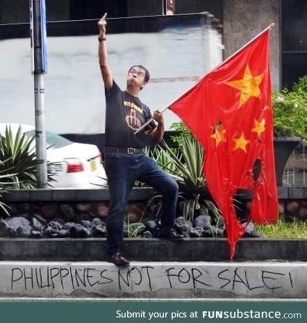 Dude in front of the Chinese embassy