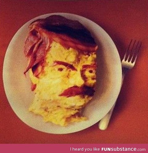 Ron swanson's face made out of bacon and eggs