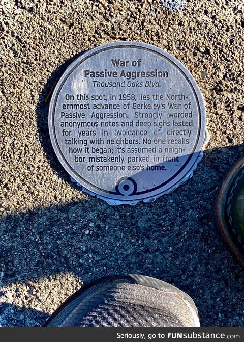“War of Passive Aggression" Historical plaque attached to sidewalk Berkeley California