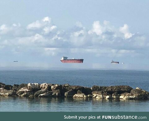 Fata Morgana mirage makes these Black Sea tankers seem to float in mid-air. The term