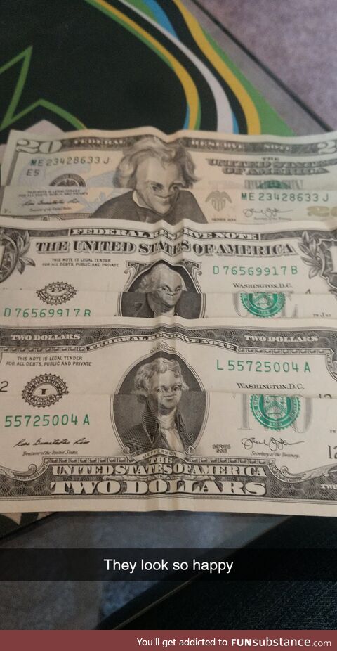 I was bored, so I folded my money to make the faces look funny