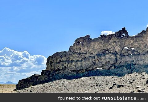 The volcanic wall at Ship Rock, NM looks like a Dragon head. The clouds even looked like