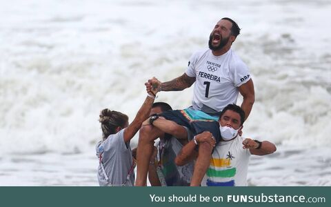 Brazil's Ferreira claims surfing's first gold