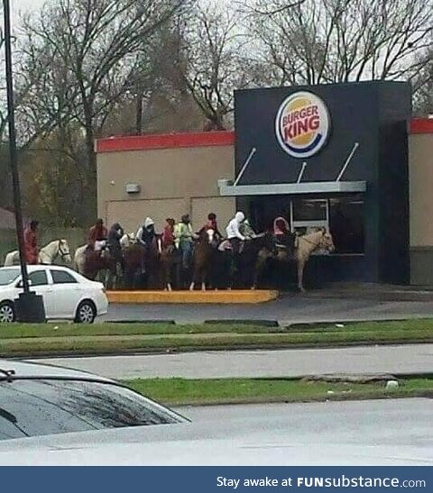 Knights lining up to receive their meal from the king