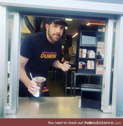 Ben Affleck working the drive-thru window at Dunkin in Medford, MA today