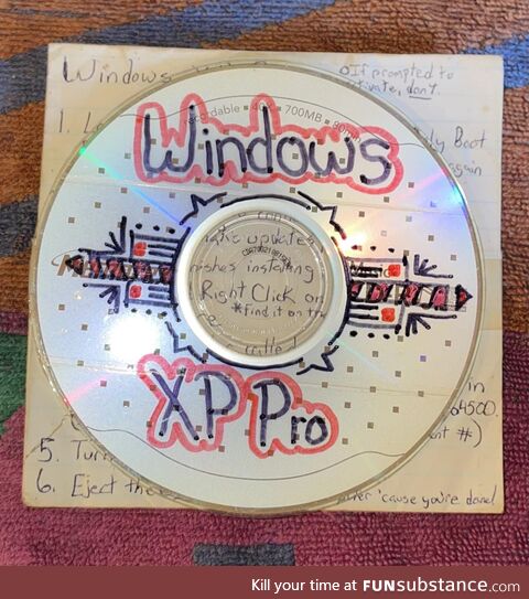 [OC]Doing some death cleaning and found the bootleg Windows I had to use to save my dying