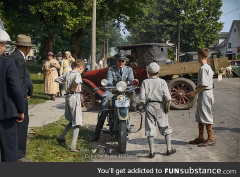 State cop's motorcycle admired by the local boys in Albany, Vermont, 1936. Colorized by