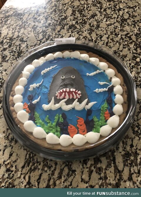 “Of course I know what a shark looks like!” -The baker who decorated this cookie