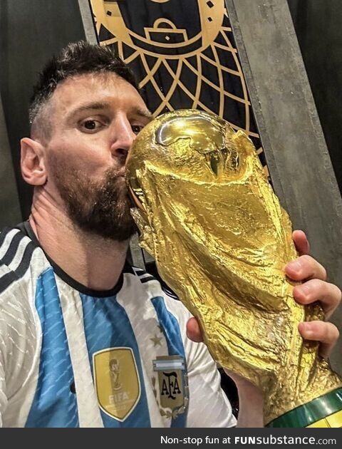 Messi with the FIFA WC