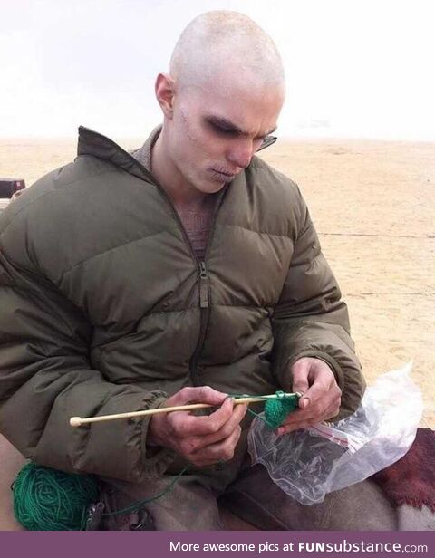 Nicholas Hoult learning how to knit on the set of Max Max: Fury Road