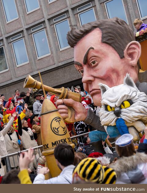 Elon Musk as Bond villain at today's carnival parade in Cologne, Germany
