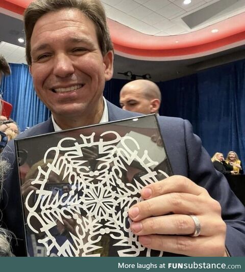 DeSantis accepts snowflake gift without looking closely