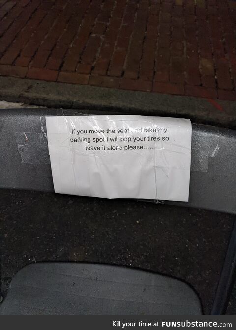 Space savers in Boston during snow