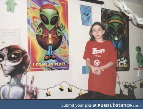 Nothing says awkward middle school years like a Wendy’s tee and a room full of aliens