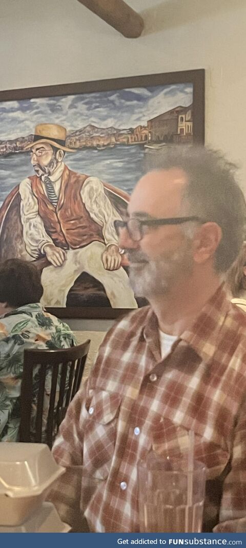 My dad looks exactly like a man in a painting in an Italian restaurant