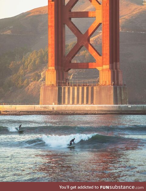 Surfing under the Golden Gate Bridge in SF