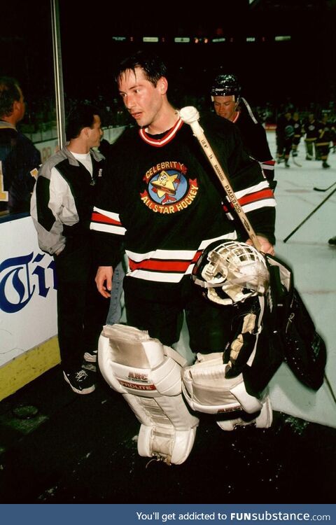 John Wick playing hockey in 1997