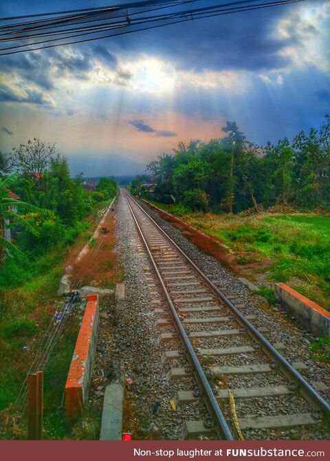 Shot while crossing railway tracks in Indonesia
