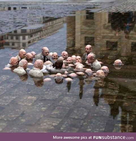 “Politicians Discussing Global Warming" Sculptural installation by Isaac Cordal????