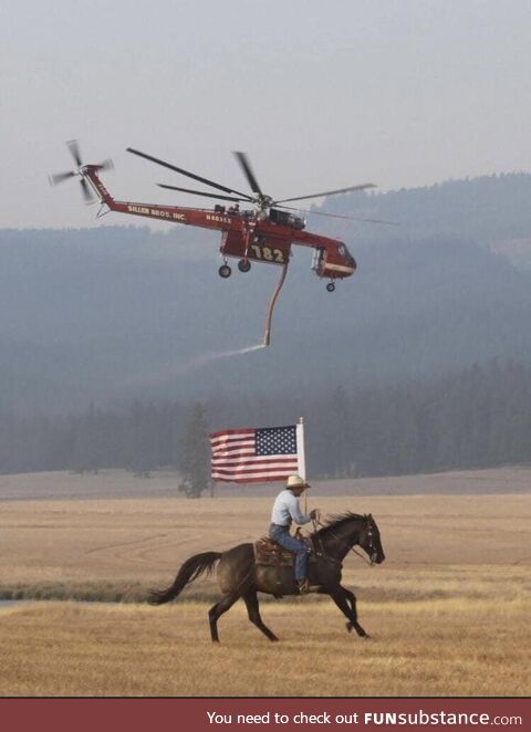 Rancher shows his thanks to helicopter firefighting crew pilling water off his property
