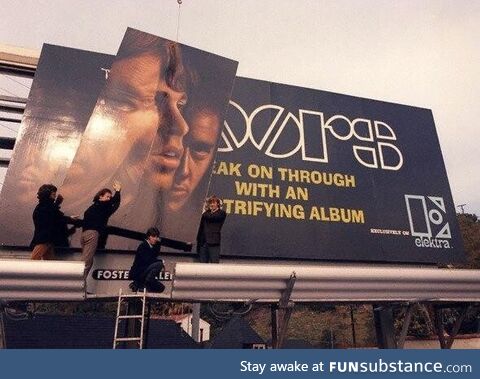 The Doors help set up their Sunset Strip billboard promoting their debut album in 1967