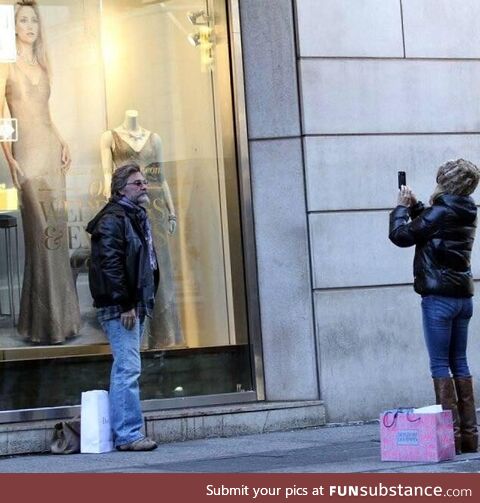 That's my girl: Goldie Hawn snaps photo of partner Kurt Russell in front of a Kate Hudson