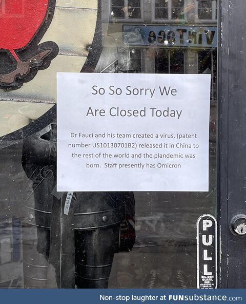 Closed sign by a business
