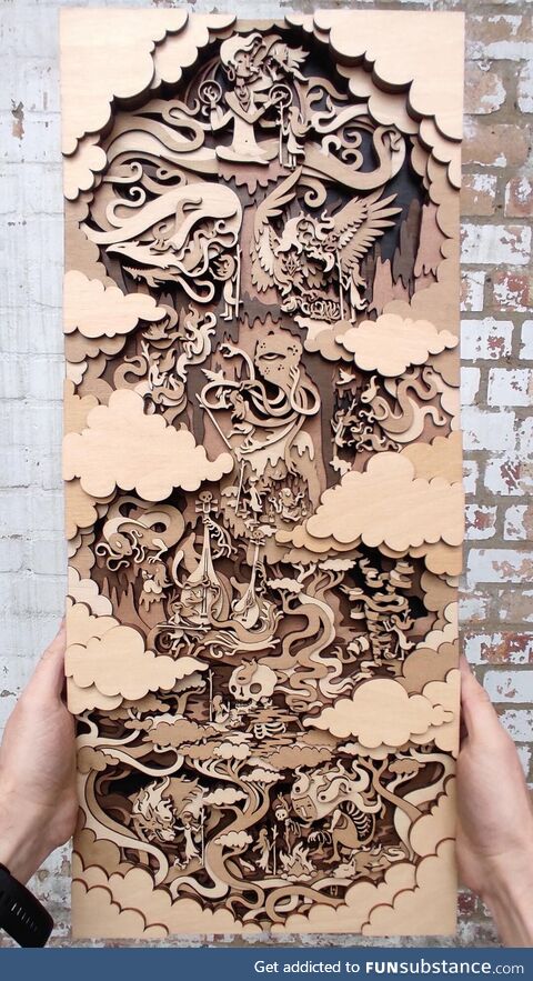 Fantasy illustration made from layers of laser cut stained plywood, designed and made by