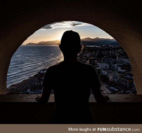 [OC] A friend of mine admiring the sunset from an arch in Sperlonga