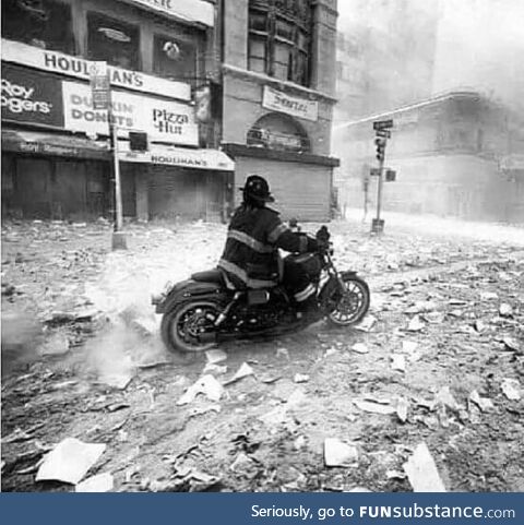 NY Fireman Tim Duffy rides into the city on his motorcycle on 9-11