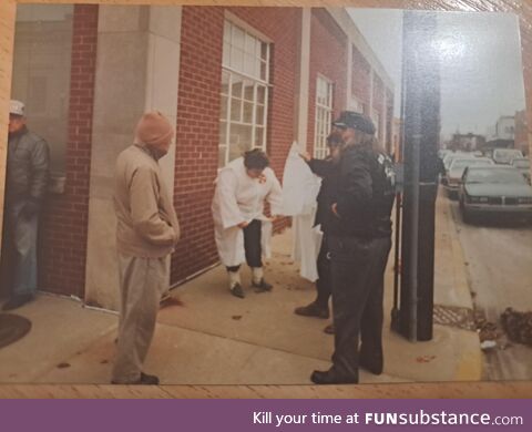 Found a picture of my great grandpa ( in the brown ) confronting the KKK