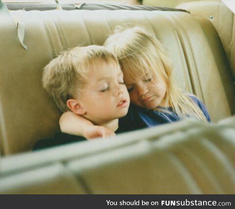 My sister and I asleep on a car ride home (some time in the mid 90s)